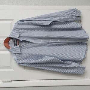 A blue and white strip Roundtree & Yorke button down shirt.